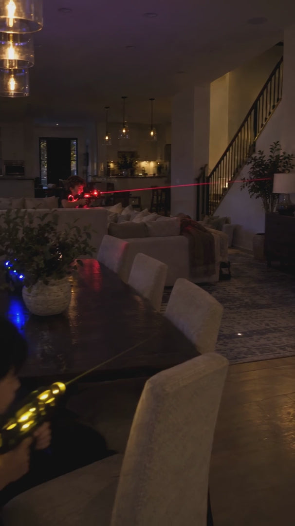 Kids playing LaserFury laser tag in the living room